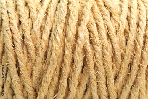 Background from jute beige rope. Close-up