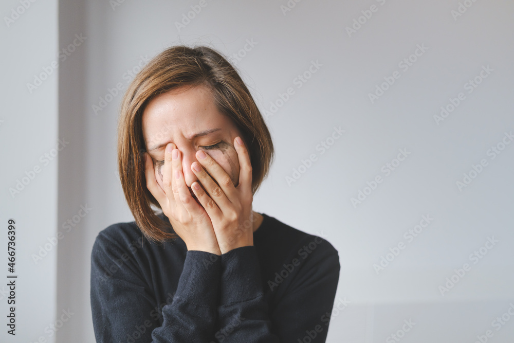 Young Female Crying And Closing Face. Concept Of Violence Against Women. Sexual And Gender-Based Violence. Soft focus Young Female Crying And Closing Face. Concept Of Violence Against Women. Sexual And Gender-Based Violence. Soft focus