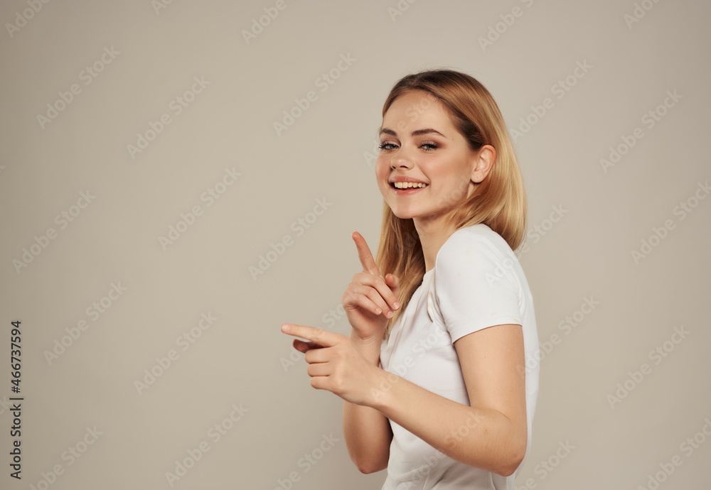 cheerful woman in a white attractive look happy Lifestyle light background cheerful woman in a white attractive look happy Lifestyle light background