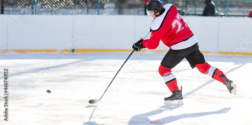 Photography Professional ice hockey player in attack on the rink