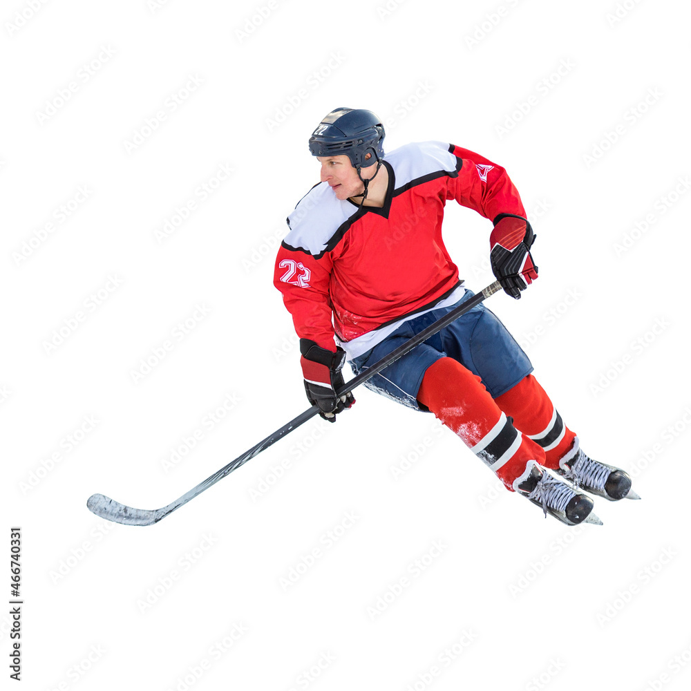 Fototapeta premium Professional ice hockey player on defending position on the rink. Isolated image on white