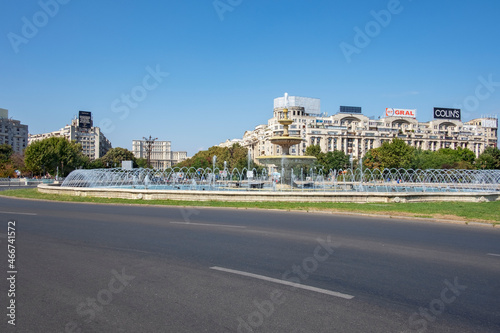 Road around the large water fountain, architectural feature near the Union Boulevard, going towards the Palace of the Parliament or People's House, Piata Unirii, Bucharest, Romania © Ana