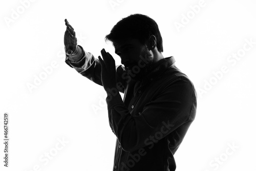 businessmen with a pistol in hand crime hand gesture isolated background