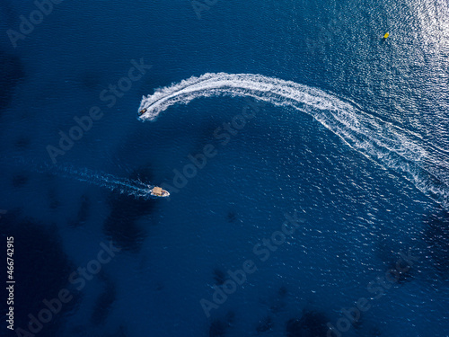 Aerial view on jetski and speed boat in tropical blue waters © Anton Tolmachov
