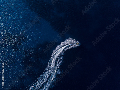 Aerial view on jetski in tropical blue waters © Anton Tolmachov
