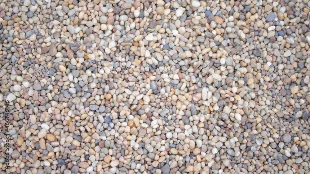 Texture background of small and colorful pebbles on a beach. Texture background of small and colorful pebbles on a beach.