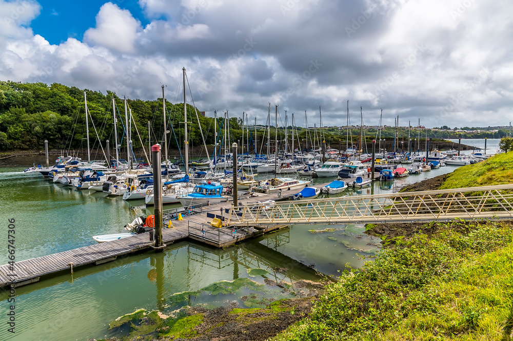 A view down Westfield Pill showing boats moored at Neyland, Pembrokeshire, South Wales on a summers day