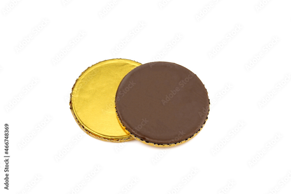 Chocolate sweets wrapped in yellow foil. Fake dessert coins Chocolate sweets wrapped in yellow foil. Fake dessert coins