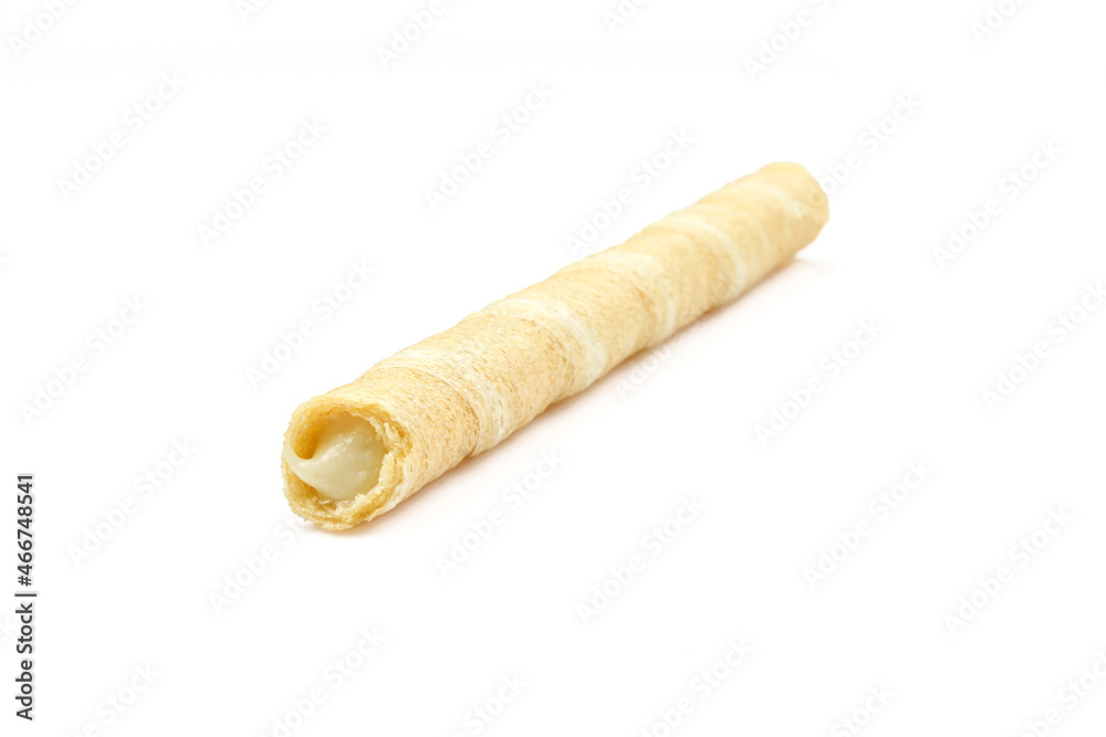 Single crispy roll stuffed with vanilla flavor filling and isolated on white background Single crispy roll stuffed with vanilla flavor filling and isolated on white background