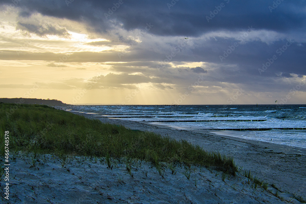 View over the dunes to the Baltic Sea at sunset