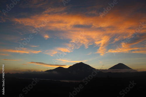 sunrise clouds and the mountains, the photo was taken in the morning before the sun about to rise, located in Kintamani Bali Indonesia, shows line up og Mount Abang and Mount Agung.