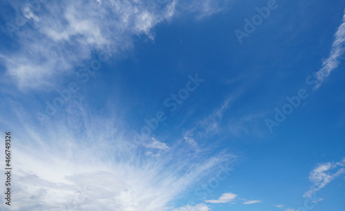 White cumulus clouds formation in blue sky background