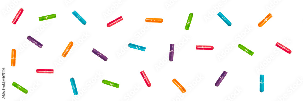 Colorful tampons isolated on the white background, a plug of soft material inserted into the vagina to absorb menstrual blood Colorful tampons isolated on the white background, a plug of soft material inserted into the vagina to absorb menstrual blood