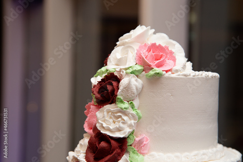white wedding cake with roses