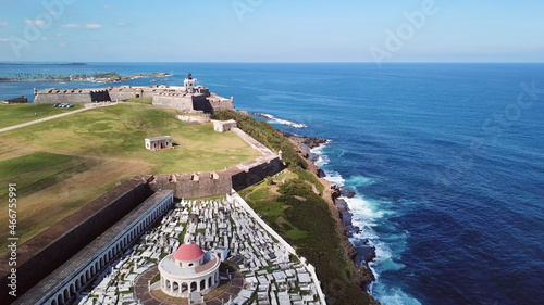 Aerial view of Castillo San Felipe del Morro, the Spanish fort in San Juan, Puerto Rico, with the Santa María Magdalena de Pazzis Cemetery in the foreground. photo
