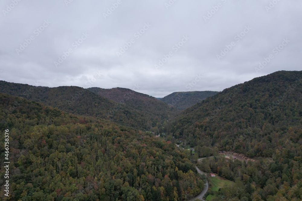 Aerial drone view over the dense green autumn forests of the Appalachian Mountains in West Virginia 