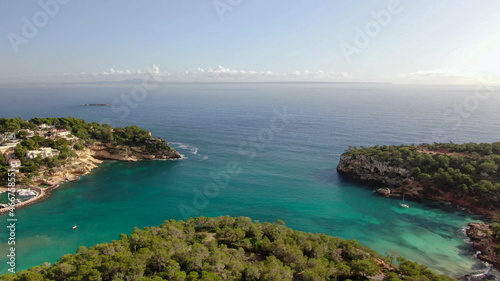 Portal Vells Mallorca. Aerial view of the seacoast of the beach in Mallorca with torquoise water colour. Amazing photo of the beach. Concept of summer, travel, relax and holiday and vacation 