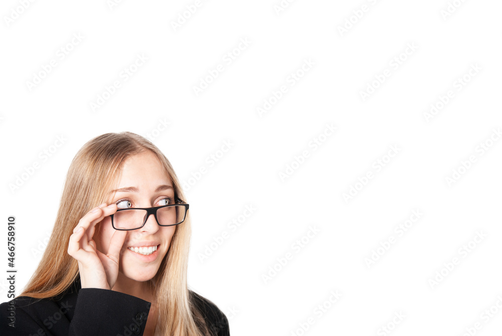 Happy smiling young blond woman wearing glasses looking up, with copyspace, isolated on white background Happy smiling young blond woman wearing glasses looking up, with copyspace, isolated on white background