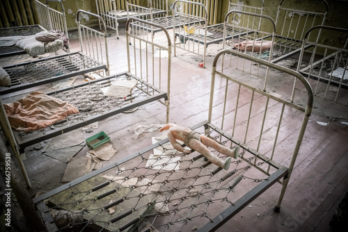 Bedroom in abandoned kindergarten Cherrnobyl zone, Ukraine photo