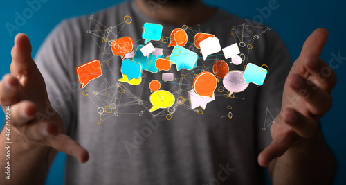 Hand holding using mobile phone with email icon on screen. Concept of business communication