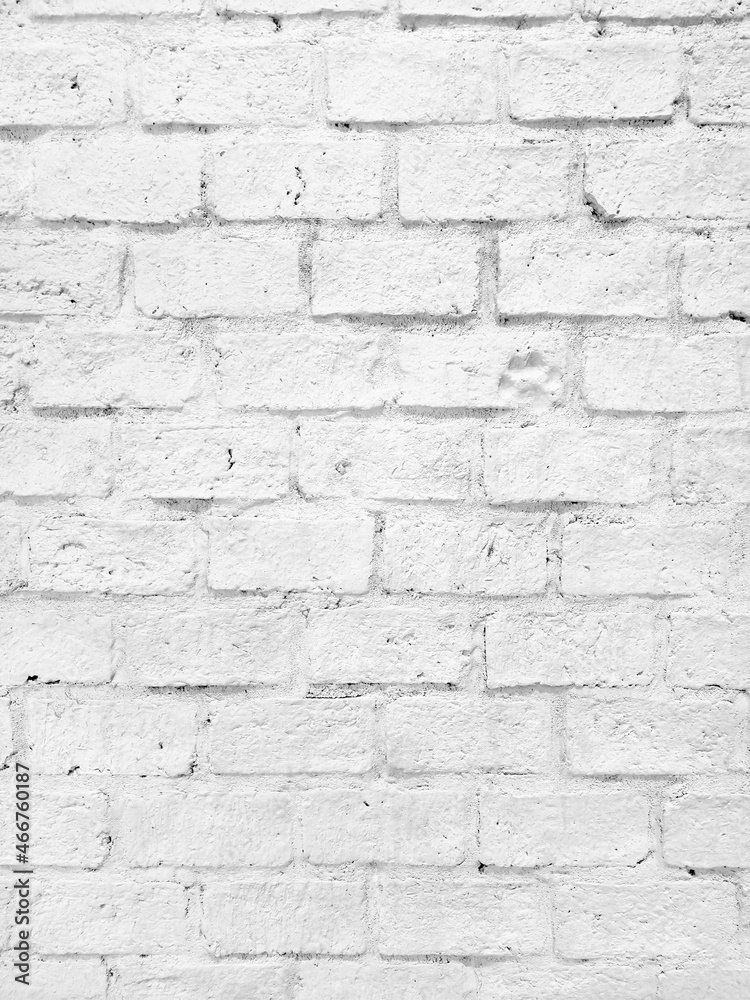 close up shot at the surface of bumpy rusty white brick pattern wall with stamped of dog footprint. natural stone brick Wall texture for loft, industrial concept design. high defination image. close up shot at the surface of bumpy rusty white brick pattern wall with stamped of dog footprint. natural stone brick Wall texture for loft, industrial concept design. high defination image.