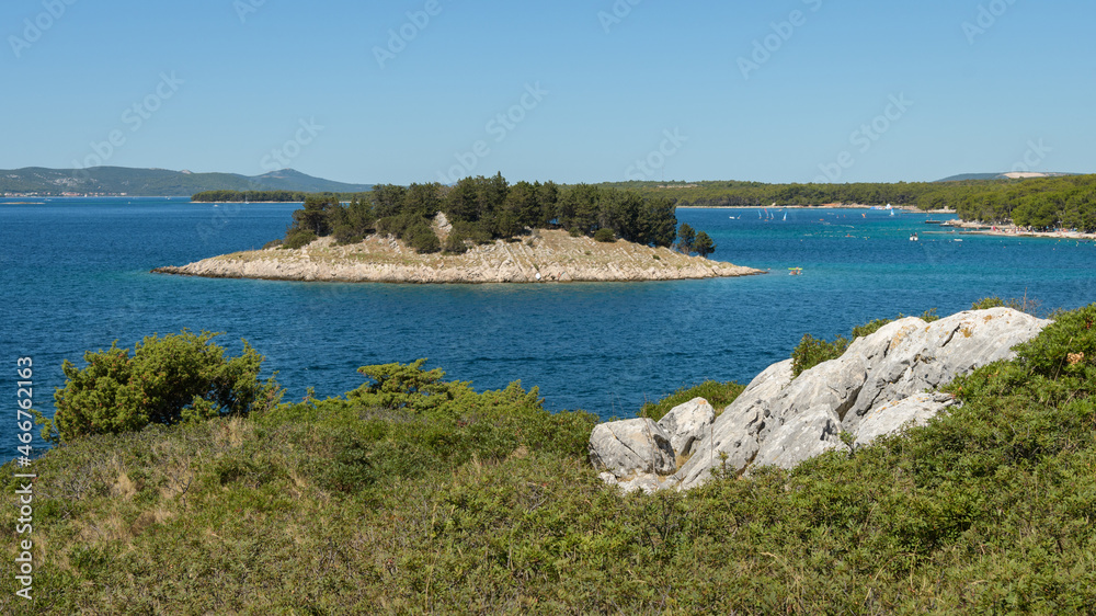Small island near Pakostane on a sunny day in summer Small island near Pakostane on a sunny day in summer