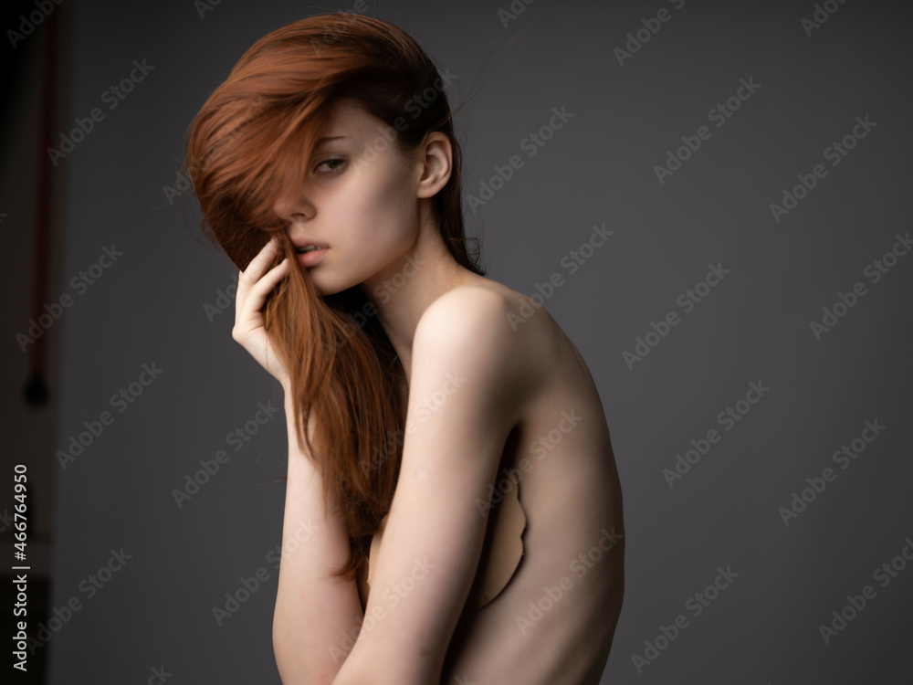 pretty woman with bare shoulders posing close-up glamor pretty woman with bare shoulders posing close-up glamor