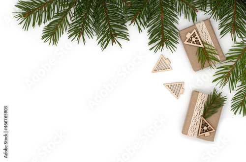 Christmas composition on white background, flat lay, top view, copy empty space, holiday concept multicolored christmas toys and gifts with fir branches © martinova4
