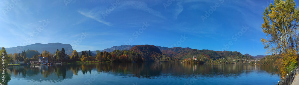 Bled, Slovenia in the most beautiful time of the year with the reflection of trees on the Lake Bled (Blejsko jezero)