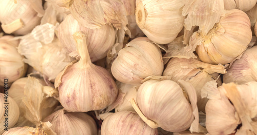 A lot of garlic in the market, texture background. Pile of garlic pattern, high quality photo
