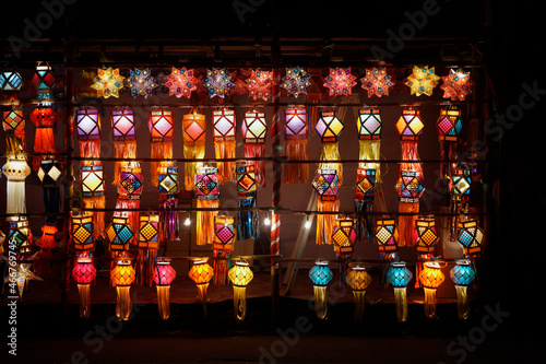 Different shaped & Vibrant colored lanterns displayed in market during festive season of Diwali in Pune city, India. © Ramnath