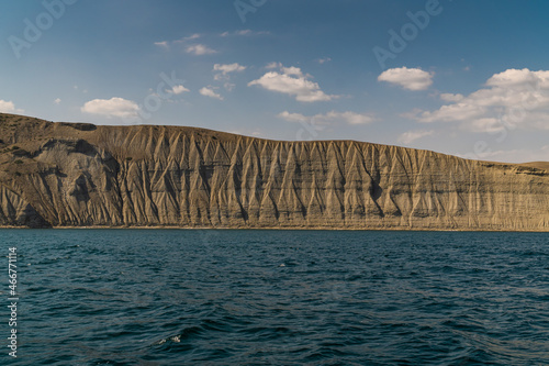 The Crimean Peninsula. July 21, 2021. Picturesque view of the coastline of Cape Meganom from the Black Sea. photo