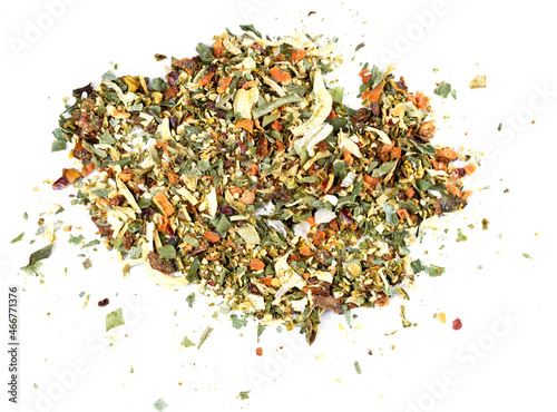 A mixture of seasonings scattered on a white background