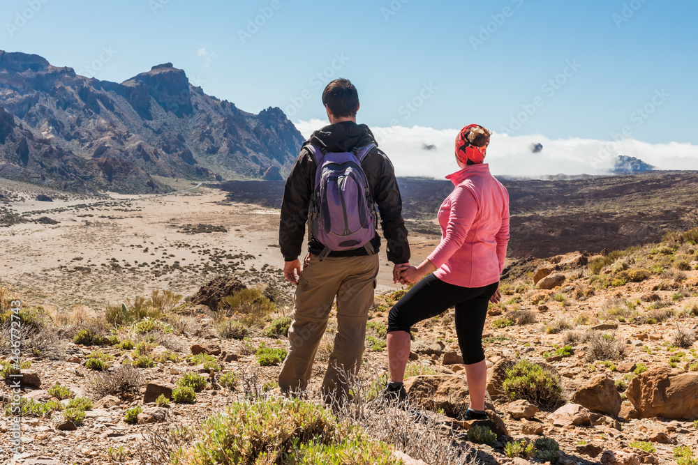 sporty couple on top of mountain. Tenerife Canary