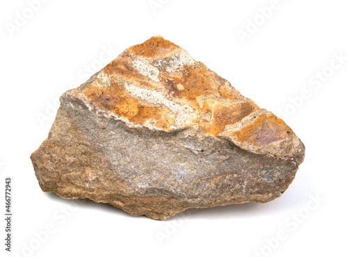A stone on a white background. A piece of rock