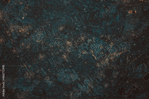 The grunge background is multicolored. Vintage old metal texture. Abstract terrible backdrop