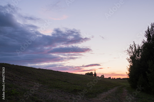 Sunset sky, skyline, field road. Wallpaper, background. 