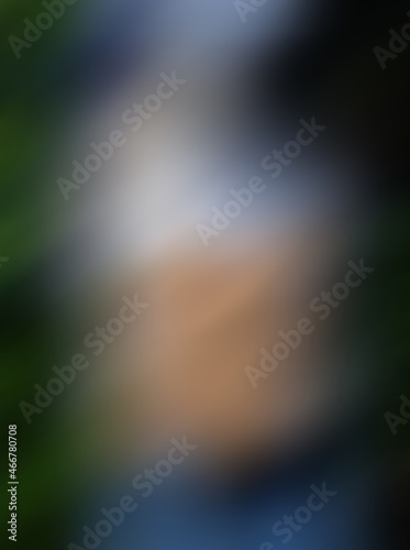 Soft blur background with cool tones of green and blue tones. 