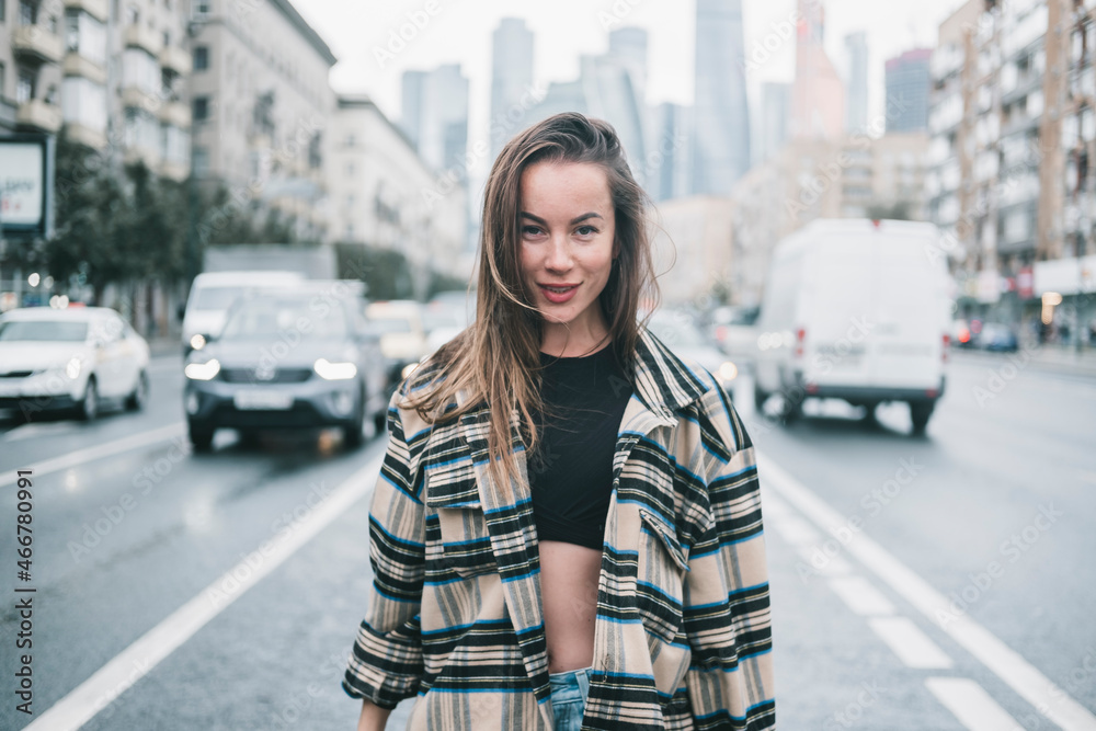 Beauty woman posing in the street, outdoor portrait
Beauty woman posing in the street, outdoor portrait