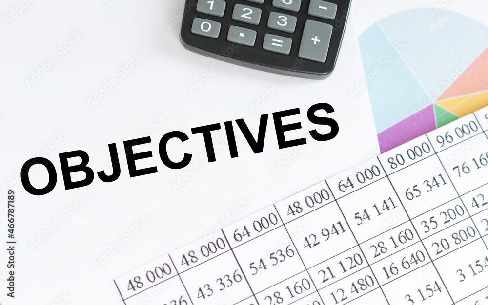 Objective text written on white paper - Business Concept Objective text written on white paper - Business Concept