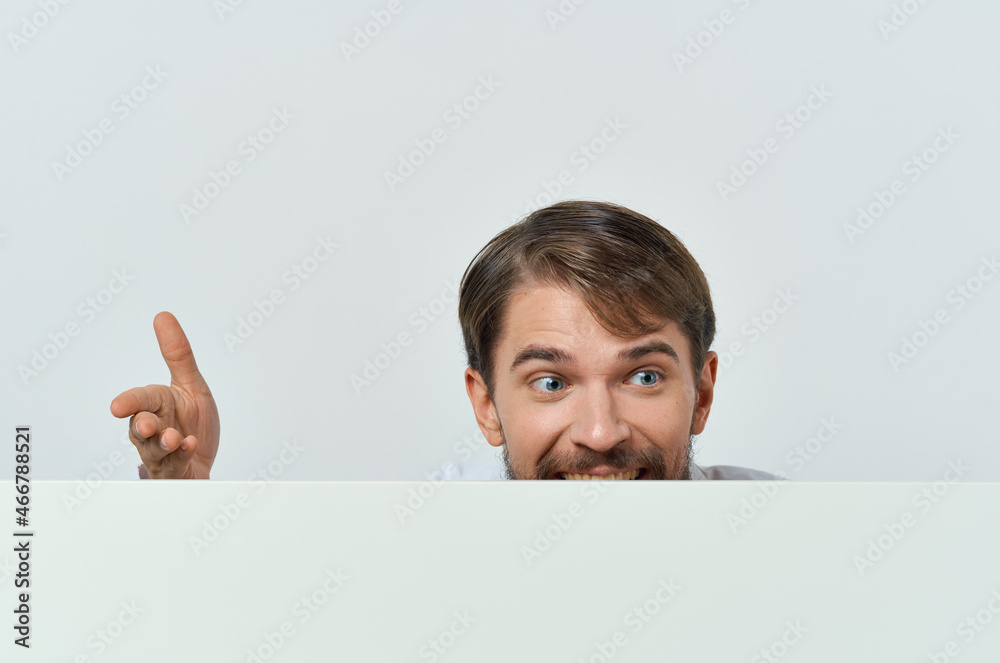 bearded man white banner in hand blank sheet presentation White background