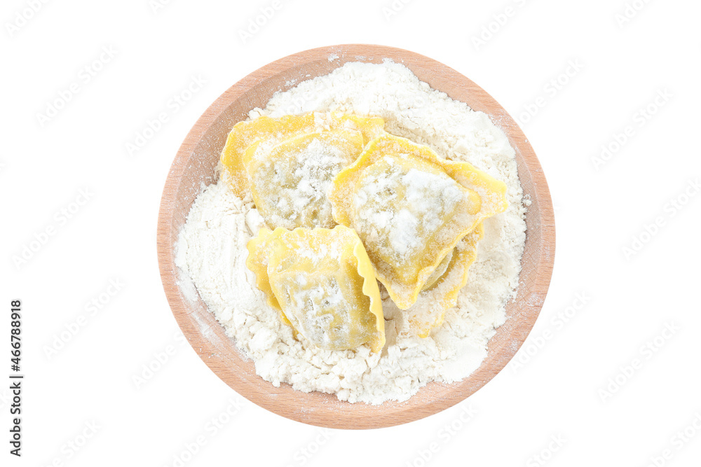 Board with raw ravioli isolated on white background