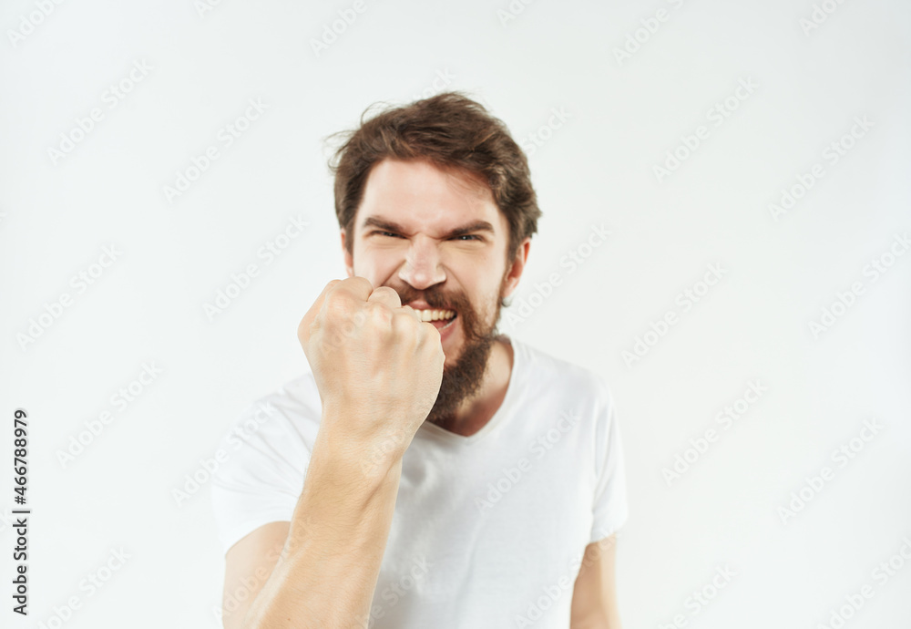 emotional bearded man gesturing with his hands anger light background emotional bearded man gesturing with his hands anger light background