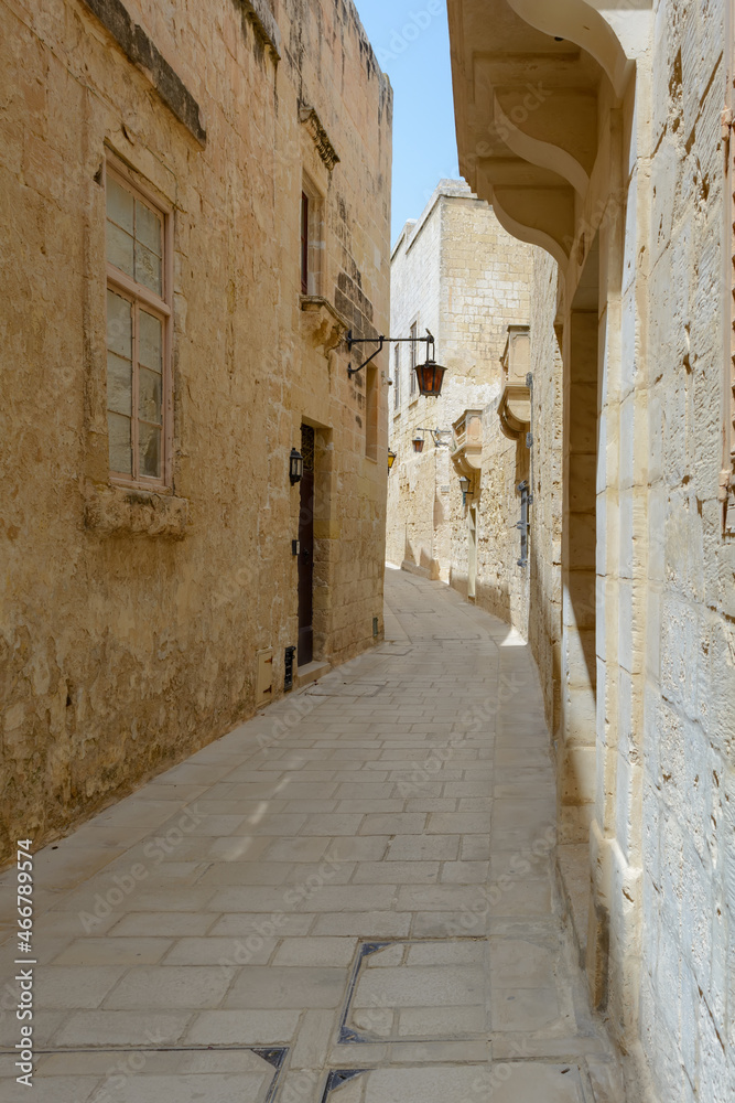 Typical Mdina street. Narrow medieval street of Mdina, also known as 