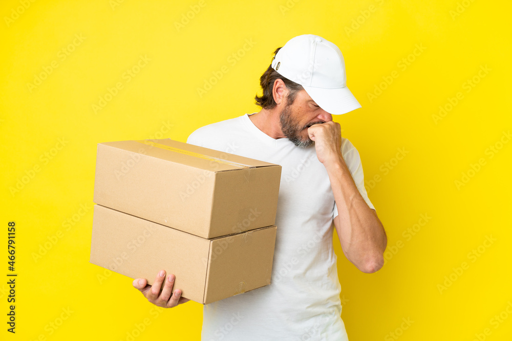 Delivery senior dutch man isolated on yellow background having doubts Delivery senior dutch man isolated on yellow background having doubts