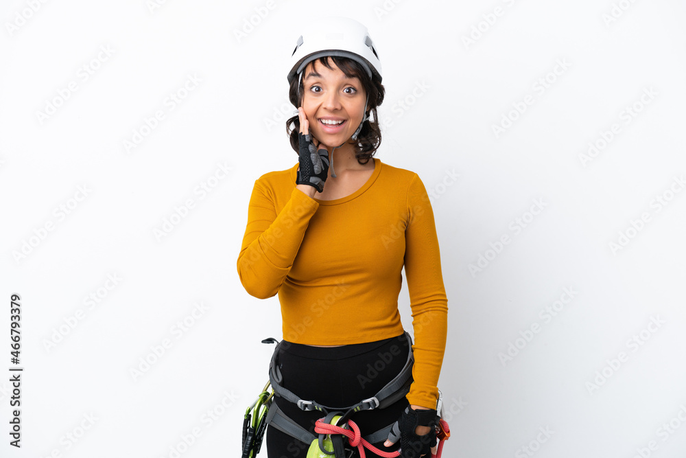 Young woman rock-climber woman isolated on white background with surprise and shocked facial expression Young woman rock-climber woman isolated on white background with surprise and shocked facial expression