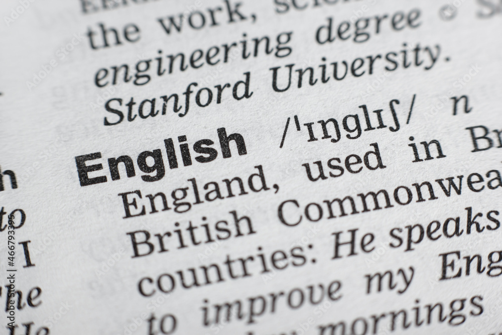 Definition of word English in dictionary. Close-up shot Definition of word English in dictionary. Close-up shot