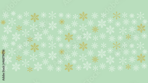 Horizontal winter background with white and gold snowflake overlay on grey background. Copy space. Elegant  trendy  classic design. Wallpaper or backdrop design.