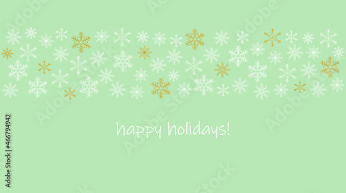 Horizontal Christmas or holiday border with white and gold snowflakes and Happy Holidays greeting on green background. Wallpaper or backdrop design.