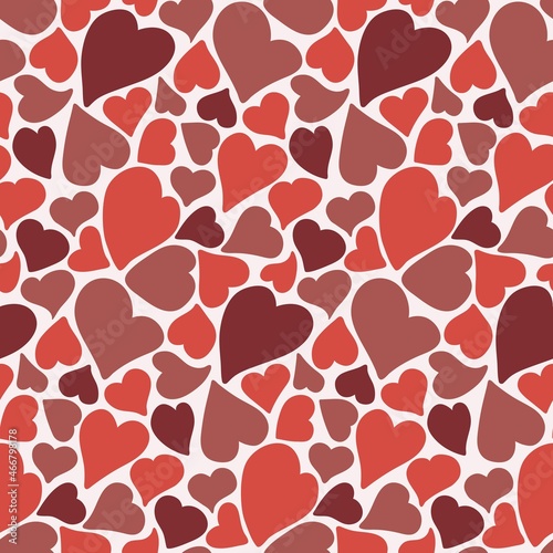 seamless pattern with red hand drawn hearts of different sizes